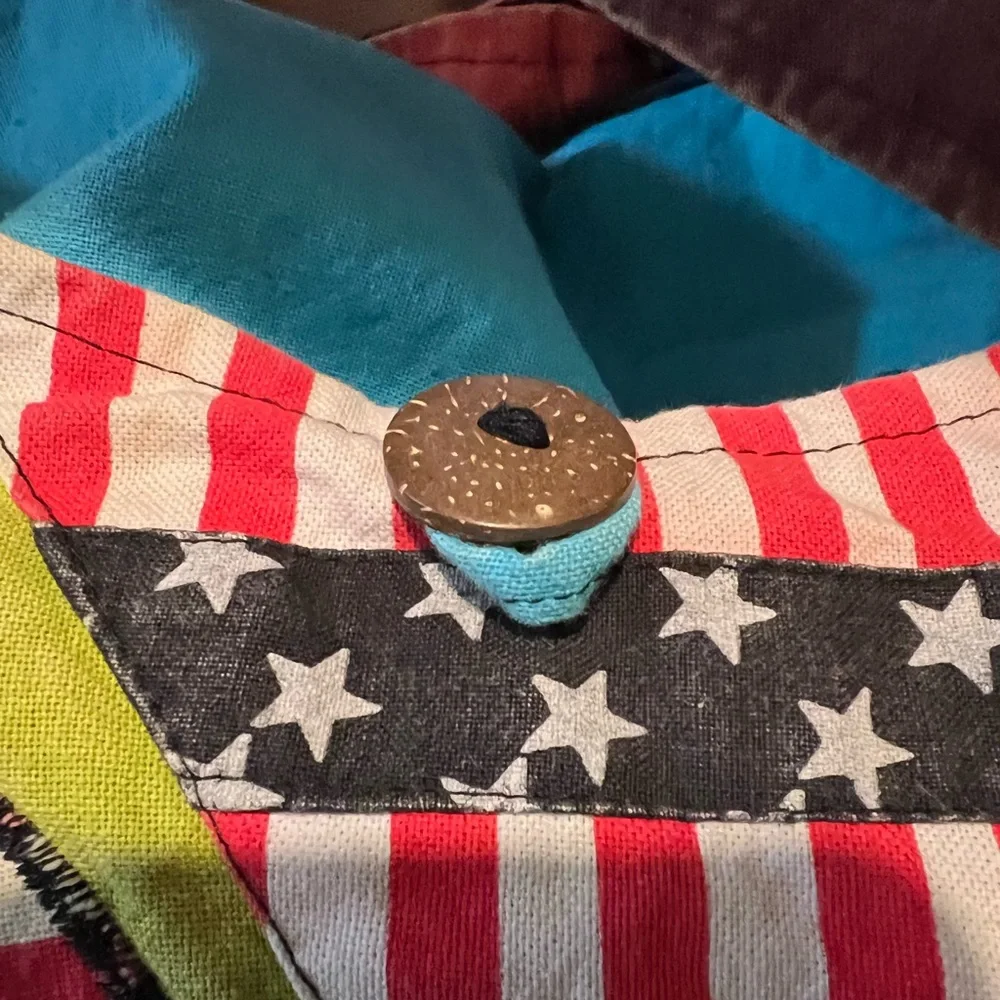 Rising International Americana Eagle bag with button and zip closure crossbody.